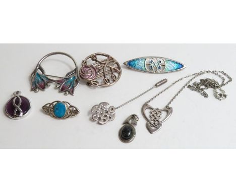 A collection of Scottish jewellery comprising of three pendants, o brooch, a stickpin and three enamel brooches