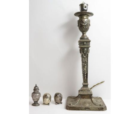 A silver loaded Neo Classical style candlestick, converted to a lamp base, decorated with acanthus and urns, London, 1899, 34