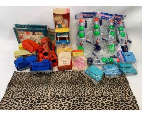 New/old stock - A collection of toys and collectables including Mattel doll, water guns, children's handbags and others items