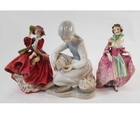 A Royal Doulton figure "Top of the Hill, HN 1834, along with Royal Doulton "Suzette, HN 1487 and Nao figure 