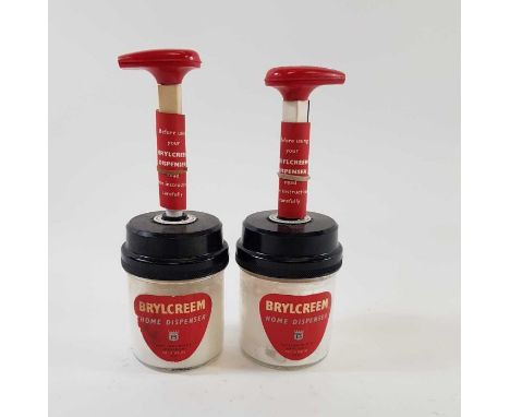 Two vintage 1950's Brylcreem barbers shop dispensers  