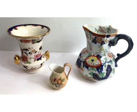 A Royal Worcester miniature jug, decorated with flowers, along with a Manson's jug and vase