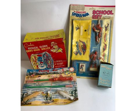 A c.1950's Magnetic Sensation toy "Perky Polly" in box; a Combex Musical Clown Come-Back roller in box; a 1960's Fishing Set 