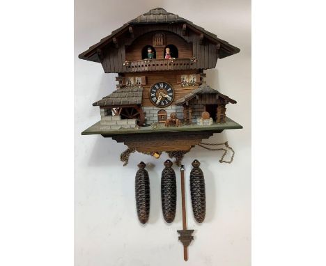 A Swiss cuckoo clock with musical movement