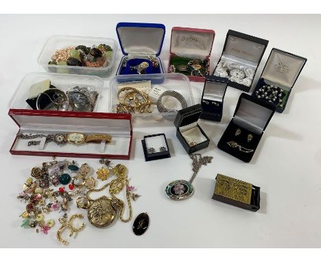 A large collection of costume jewellery and watches to include a Britannia standard 1977 silver ingot pendant and a silver ha