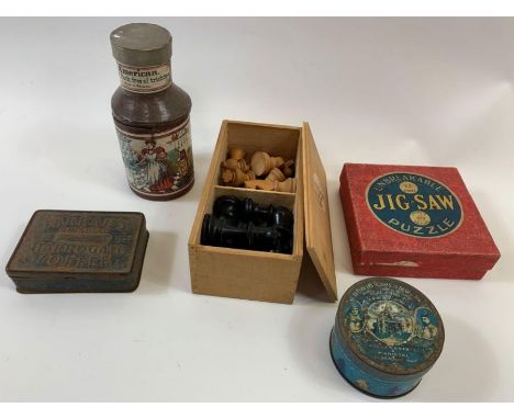 A collection of vintage toys/advertising items to include a chess set, jack in the box, two advertising tins and an "Unbreaka