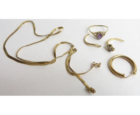 A 9ct yellow gold ring set in oval cut amethyst, 7mm x 6mm along with a broken 9ct gold chain and other items; 5.8g gross