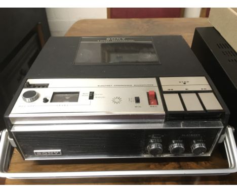 A Sony 4 speed servocontrol portable reel to reel player, a Sherwood AX4050R amplifier and a box of reels. NO RESERVE.
