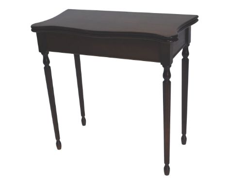 A mahogany card table in George III style, the hinged top enclosing a baize lined interior, with recesses to the corners, on 