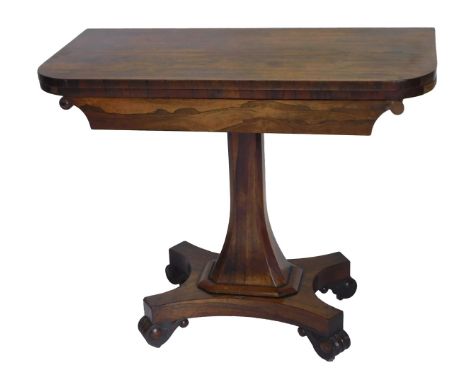 A William IV rosewood card table, the top with rounded corners, on a tapering shamford column, and a concave platform, with s