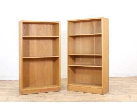 Two light oak open bookcases, designed by Børge Mogensen for Karl Andersson &amp; Söner, one with two adjustable shelves, the
