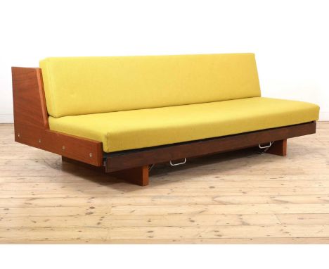 A Danish model ‘GE-258’ teak daybed,designed in 1958 by Hans Wegner for Getama, the cushions upholstered in yellow fabric, ra