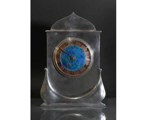 A Liberty &amp; Co. pewter desk clock,c.1900, designed by David Veasey, no. 0634, with a copper chapter ring with enamelled R