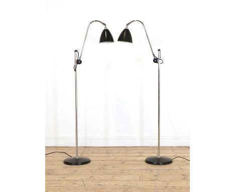A pair of 'Bestlite' floor lamps, modern, originally designed by Robert Dudley Best, each with a raised chrome support, the l