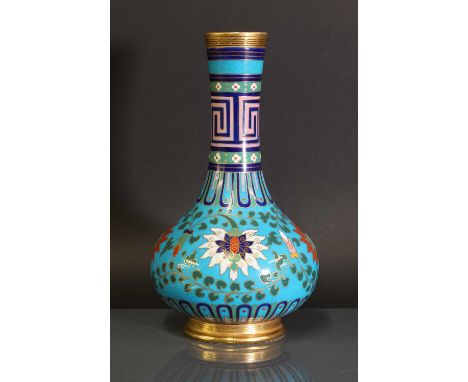 Christopher Dresser (1834-1904) for Minton and Co.,a cloisonné vase, dated 1873, of bottle form glazed earthenware with gilde