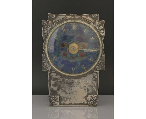 A Liberty &amp; Co. Tudric pewter and enamel mantel clock, designed by Archibald Knox, model no. 0609, of rectangular form, c