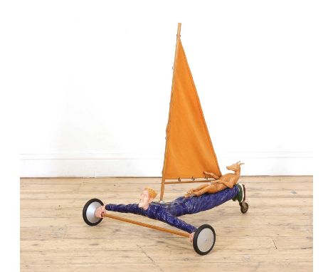 ▴ Craig Mitchell (contemporary)'Sailing Dog', 1990sa ceramic sculpture62cm wide68cm long 80.5cm highCraig Mitchell is an Edin