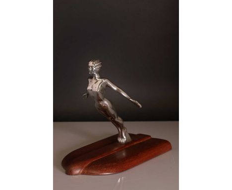 An Art Deco 'Desmo' cast and chrome car mascot,modelled as a nude female, her arms swept back, raised on a later wood plinth,