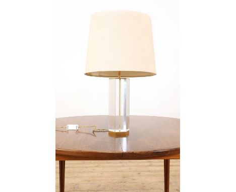 A Lucite and brass table lamp, modern, with an hexagonal column, mounted with four lights, with a cream fabric shade, 62.5cm 