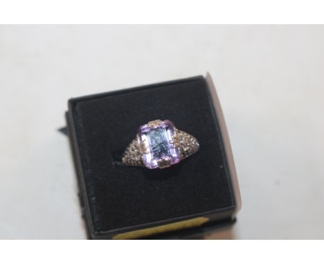 A Sterling silver and amethyst set ring, ring size N/O