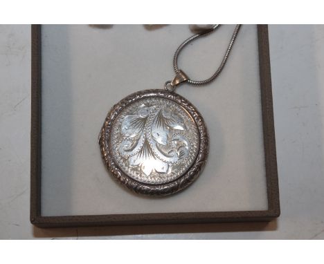 A vintage Hallmarked silver locket and chain 