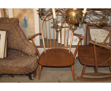 An Ercol stick back armchair 