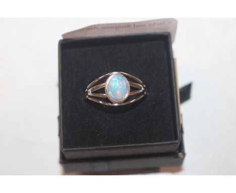 A Sterling silver and moonstone set ring, ring size L/M