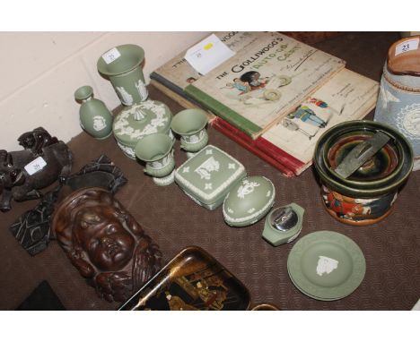 A quantity of green Wedgwood jasperware porcelain including trinket boxes, vases, table lighter etc.