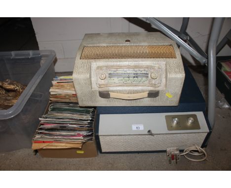 A vintage Ekco radio; a vintage record player and a quantity of 45rpm records 