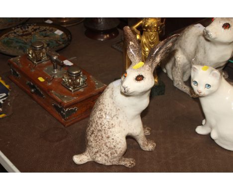 A Winstanley Pottery model of a seated hare