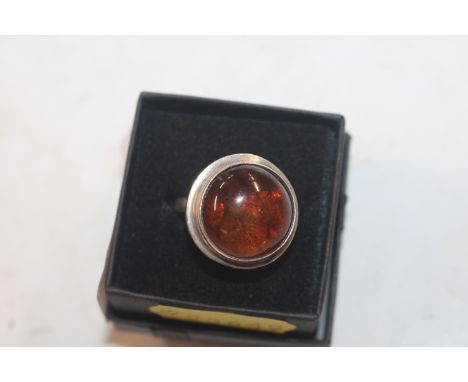 A large vintage Sterling silver and amber set ring, ring size N/O