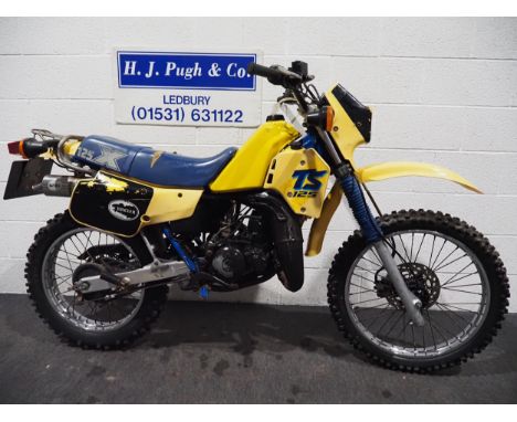 Suzuki TSX 125 motocross bike. 1885. 125cc.Frame No. SF13A-108380 Engine turns over with compression. Reg. B496 ECV. V5 and k