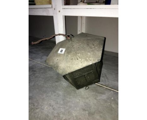 A metal framed hanging lantern