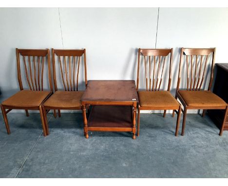 4 ladder back chairs and a table