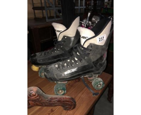 A pair of Bauer roller skates