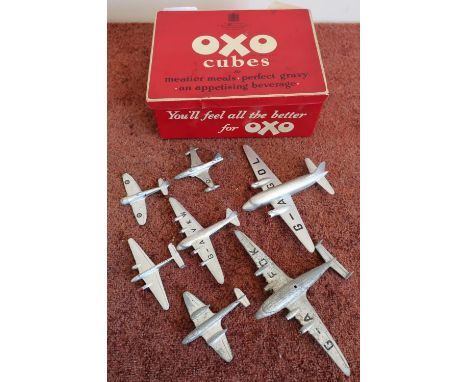 Vintage Oxo tin, containing a selection of various Dinky aircraft, sea planes etc 