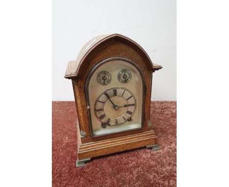 Edwardian golden oak lancet top mantel clock, silvered dial with raised chapter ring, chime, silent and regulator dials, two 