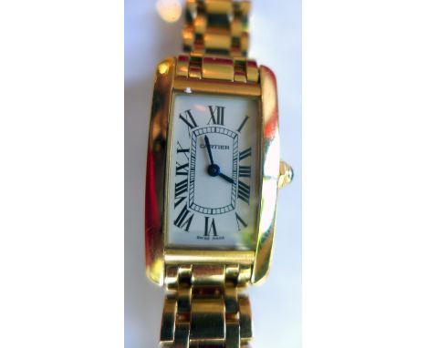 A Cartier 18k yellow gold 'Tank Americaine' ladies wristwatch, quartz movement, the white dial with Roman numerals, blued ste