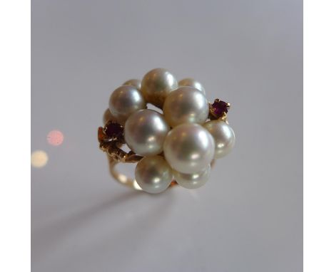 A yellow gold Ladies Pearl and Ruby cluster ring, marked 14k, size R 