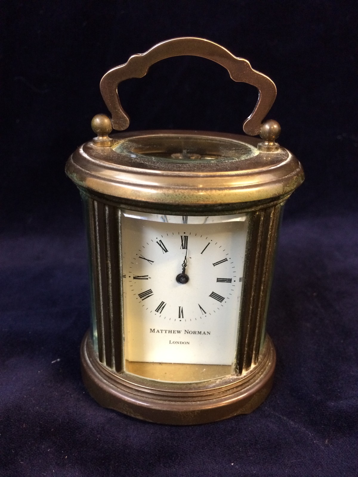 Miniature Oval Carriage Clock by Matthew Norman of London 1940's 1950's