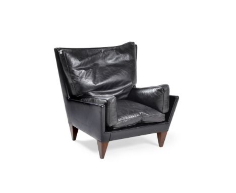 Lamberty Bespoke, a Helsinki armchair, black leather upholstered, with walnut legs, 86cm high 85cm wide    Provenance: Lamber