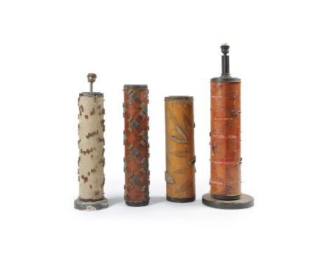 Four fabric rollers, first half 20th century, two fitted as table lamps, the largest 75cm to top of lamp holder      Provenan
