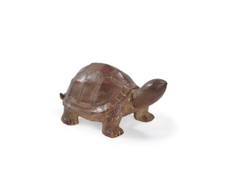 A glazed pottery tortoise sculpture, mid to late 20th century, 29cm high, 72cm wide, 37cm deep      Provenance: Lamberty Art 