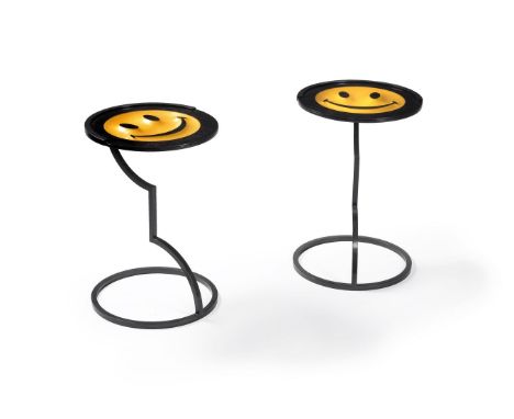 λ Ryan Callanan (RYCA) (b. 1981), a pair of Smiley tables, 2017, circular moulded with gold faces and glass tops, on metal st