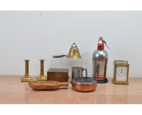 A collection of works of art, including a brass carriage clock, brass candlesticks, a brass bell and others AF (qty) 