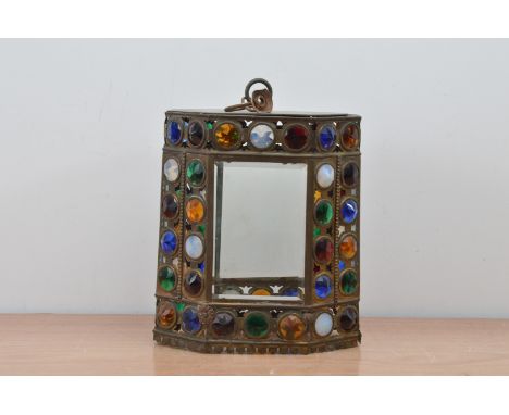 An early 20th century bullseye lantern, metal frame in a hexagonal shape, with multi coloured glass, 30cm H x 25cm W 