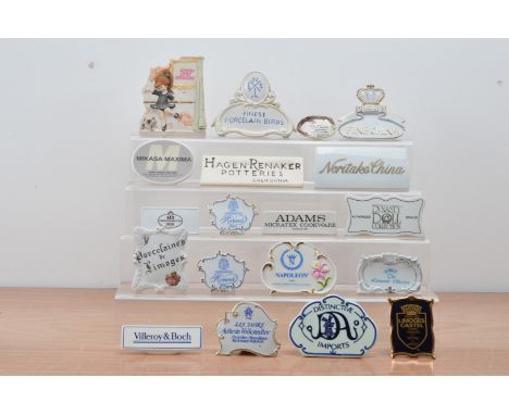 An assorted collection of ceramic advertising plaques, mostly continental, including Limoges, Villeroy &amp; Bosch, Herend (1