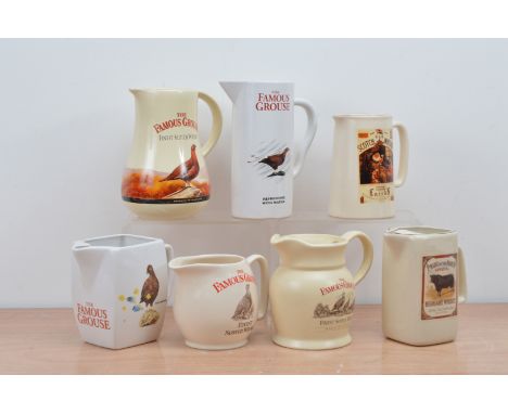 Five ceramic The Famous Grouse water jugs, together with a Laird's and Pride of the North example, of differing styles and si