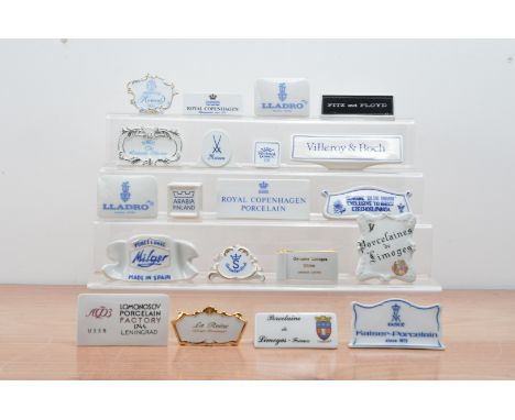 A collection of Continental ceramic advertising plaques, including Llodra, Limoges, Royal Copenhagen, Kaiser (20) 