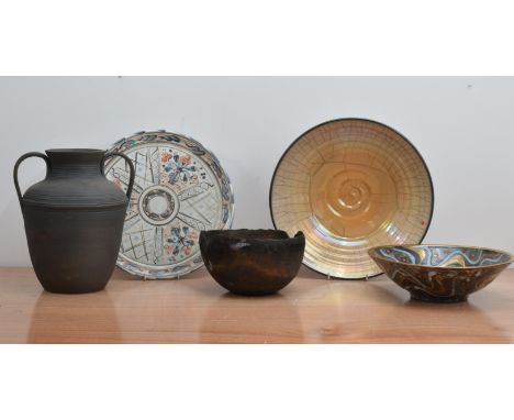 A collection of 20th century studio pottery, comprising an earthenware bowl, wavy lustre decoration, impressed mark to the un